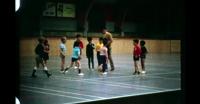 Kids playing indoor soccer